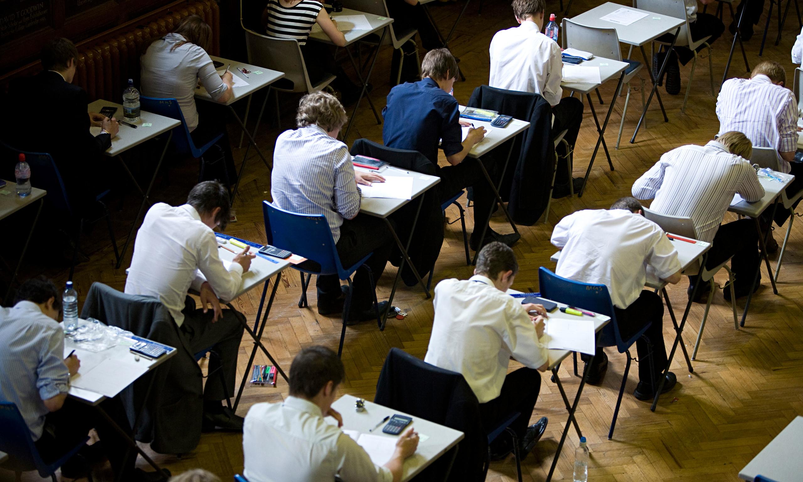 Pupils fill an exam hall to take a GCSE exam